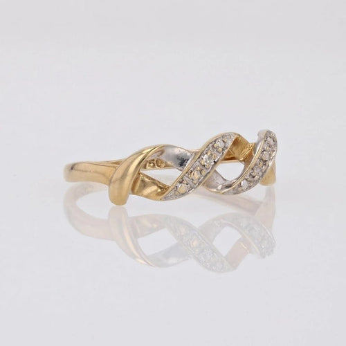 Bague 53 Bague moderne entrelacée en or jaune et blanc avec diamants 58 Facettes 16-344D