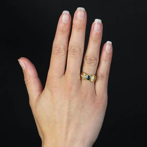 Bague 53 Bague nœud en or jaune 18 carats saphir et diamants 58 Facettes 21-222B