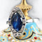Bague 53 Bague Art déco navette en or blanc 18 carats saphirs et diamants 58 Facettes 23-144