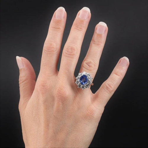 Bague 52 Bague marguerite ancienne en or blanc avec saphir et diamants 58 Facettes 22-205