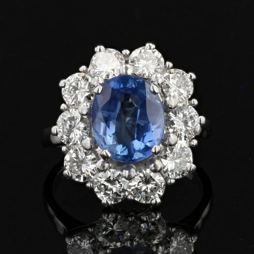 Bague 52 Bague marguerite ancienne en or blanc avec saphir et diamants 58 Facettes 22-205