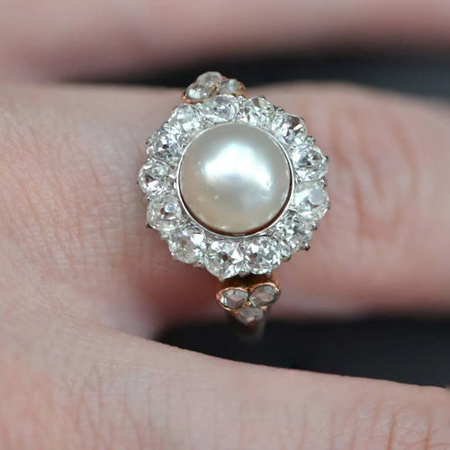 Bague 55 Bague marguerite ancienne perle fine et diamants en or rose 58 Facettes 19-642