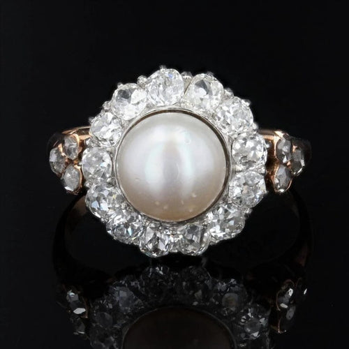 Bague 55 Bague marguerite ancienne perle fine et diamants en or rose 58 Facettes 19-642