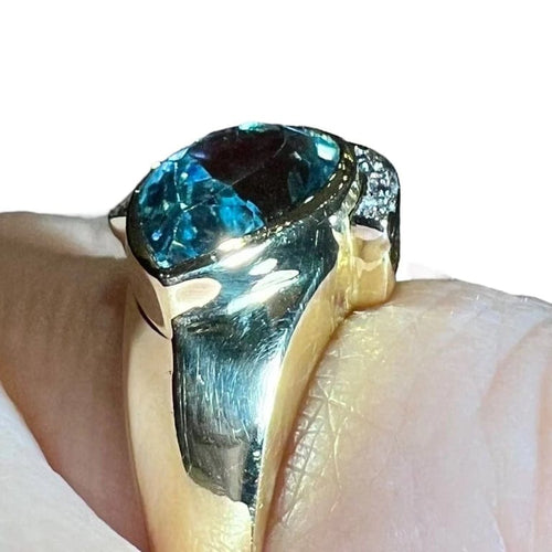 Bague 60 Bague en or jaune 18 carats avec topaze bleue poire et diamants 58 Facettes 7861 A