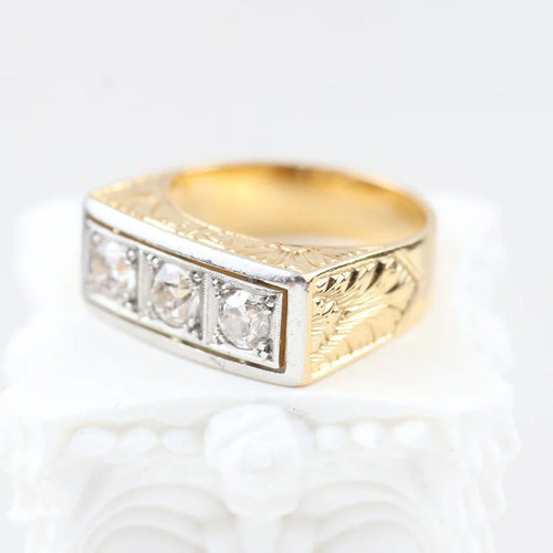 Bague 54 Bague vintage trois pierres en or jaune, platine et diamants 58 Facettes 2335
