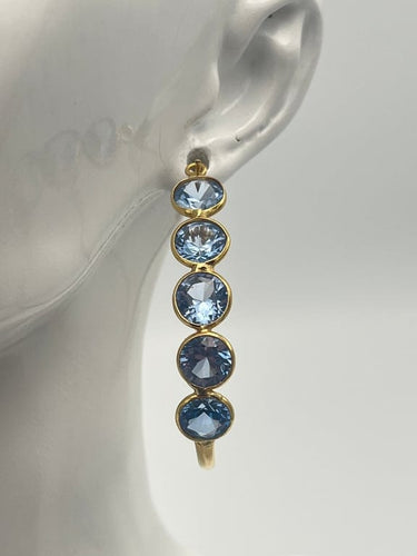 Boucles d'oreilles Créoles - Boucles d'oreilles en or jaune 18K et topazes bleues 58 Facettes 149064377