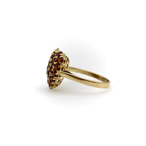 Bague Bague cœur vintage en or jaune 18k et grenats pavés 58 Facettes A20047