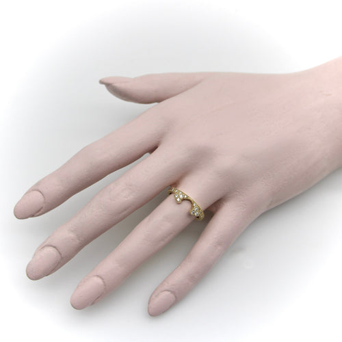 Bague 54 Bague alliance contournée en or jaune 14K avec diamants 58 Facettes