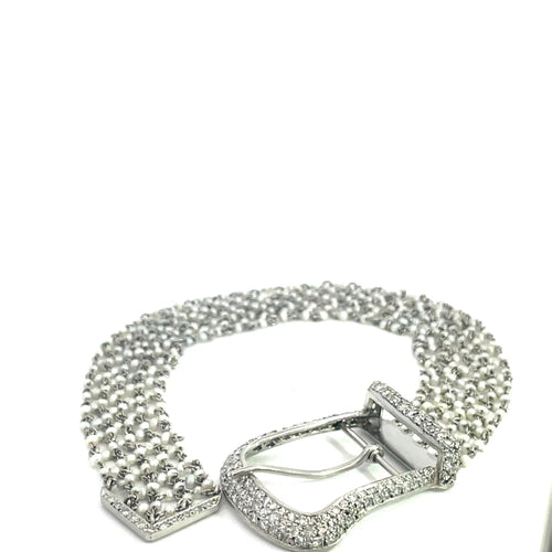 Bracelet Bracelet boucle Art déco en platine, perles et diamants 58 Facettes UN0056