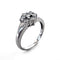 Bague Bague rosette en or blanc 18 ct et diamants 58 Facettes UKA000003RN