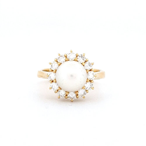Bague 54 Bague en or jaune 18 kt avec perle Akoya et diamants 58 Facettes