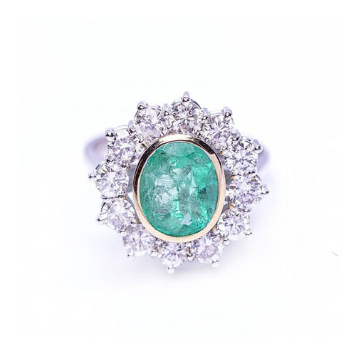 Bague RAINA - Bague en or bicolore 18 ct avec diamants et émeraude 58 Facettes UKD359454EJ