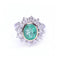 Bague RAINA - Bague en or bicolore 18 ct avec diamants et émeraude 58 Facettes UKD359454EJ