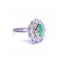 Bague RAINA - Bague en or bicolore 18 ct avec diamants et émeraude 58 Facettes UKD359454EJ