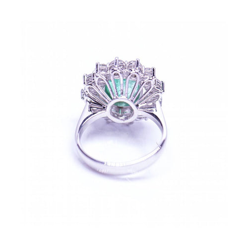 Bague RAINA - Bague en or bicolore 18 ct avec diamants et émeraude 58 Facettes UKD359454EJ