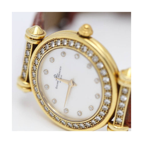Montre Baume & Mercier Classic - Montre femme en or jaune 18 ct avec diamants 58 Facettes UKD362658