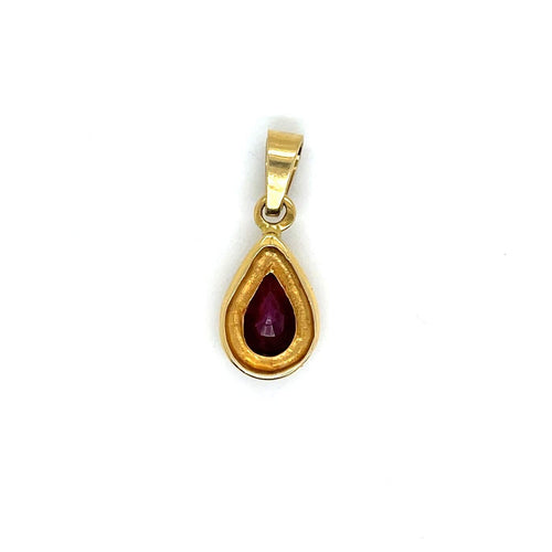 Pendentif Pendentif en or jaune 750 serti d’un rubis taille poire 58 Facettes