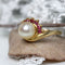 https://www.bijouxbaume.com/upload/image/bague-or-jaune-perle-de-culture-et-rubis-p-image-164604-grande.jpg