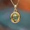 https://www.bijouxbaume.com/upload/image/pendentif-peridot-cabochon-et-sa-fine-chaine-en-or-jaune-p-image-162825-grande.jpg