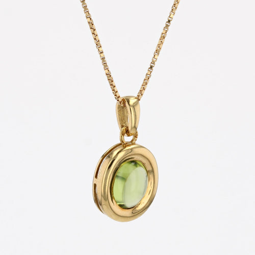 https://www.bijouxbaume.com/upload/image/pendentif-peridot-cabochon-et-sa-fine-chaine-en-or-jaune-p-image-162822-grande.jpg