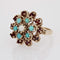 https://www.bijouxbaume.com/upload/image/bague-fleur-or-jaune-grenats-turquoise-perle-p-image-154915-grande.jpg