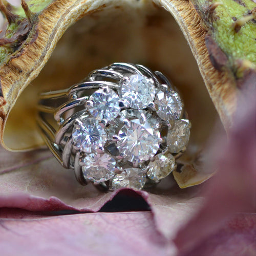 https://www.bijouxbaume.com/upload/image/bague-marguerite-de-diamants-sur-fils-d-or-p-image-128867-grande.jpg