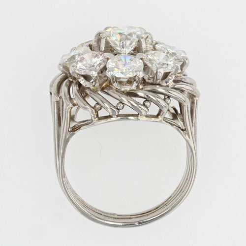https://www.bijouxbaume.com/upload/image/bague-marguerite-de-diamants-sur-fils-d-or-p-image-128872-grande.jpg