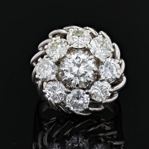 https://www.bijouxbaume.com/upload/image/bague-marguerite-de-diamants-sur-fils-d-or-p-image-128873-grande.jpg