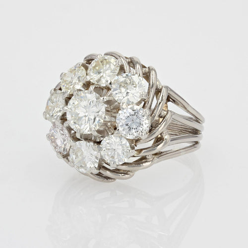 https://www.bijouxbaume.com/upload/image/bague-marguerite-de-diamants-sur-fils-d-or-p-image-128862-grande.jpg