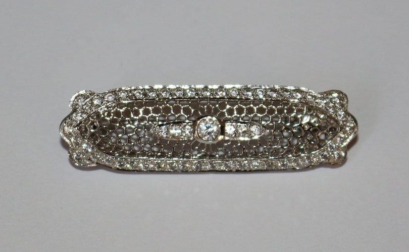 Broche Broche-barrette Art déco en or blanc 18 carats et diamants 58 Facettes 603