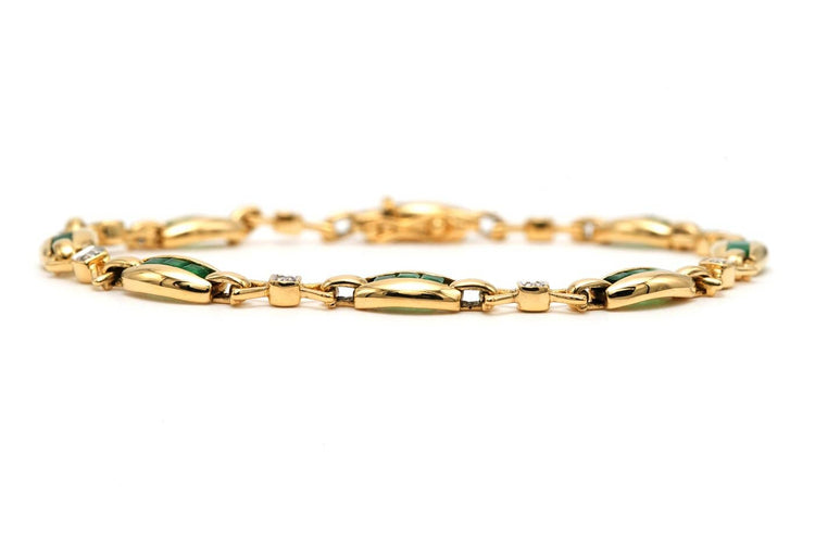 Bracelet Bracelet contemporain en or jaune 18 carats serti d’émeraudes et diamants 58 Facettes B727