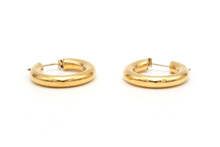 Boucles d'oreilles Boucles d'oreilles créoles contemporaines en or jaune 18 carats 58 Facettes B664
