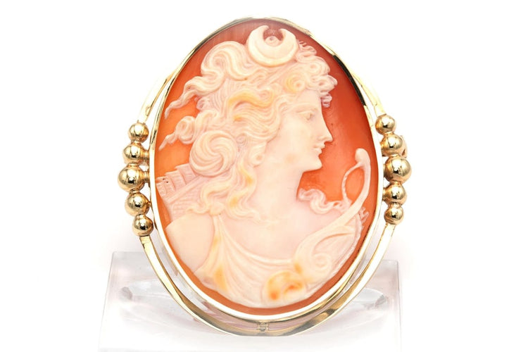 Broche Broche Art déco en or jaune 18 carats sertie d’un camée 58 Facettes B363