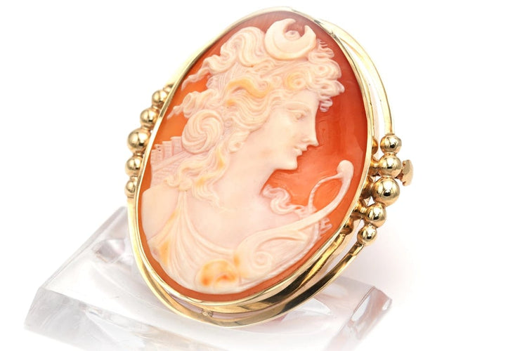 Broche Broche Art déco en or jaune 18 carats sertie d’un camée 58 Facettes B363