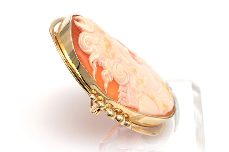 Broche Broche Art déco en or jaune 18 carats sertie d’un camée 58 Facettes B363