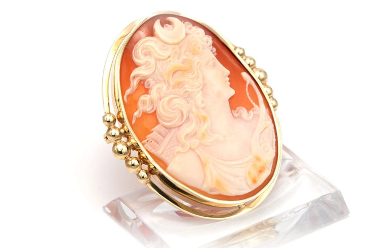 Broche Broche Art déco en or jaune 18 carats sertie d’un camée 58 Facettes B363