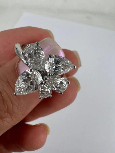 Bague Bague en or blanc 18 carats avec fleur solitaire en diamant 58 Facettes P756