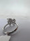 Bague Bague en or blanc 18 carats avec fleur solitaire en diamant 58 Facettes P756