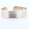 Bracelet Cartier - Bracelet jonc ouvert Double C en or jaune 18 carats 58 Facettes 73524