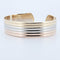 Bracelet Cartier - Bracelet jonc ouvert Double C en or jaune 18 carats 58 Facettes 73524