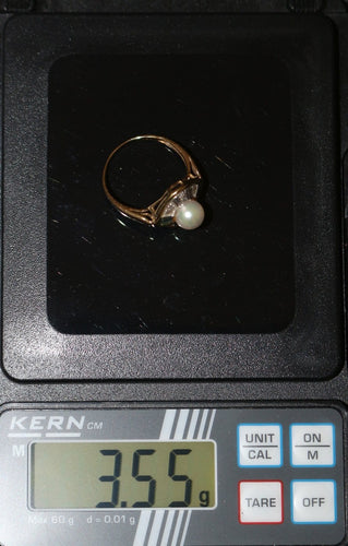 Bague 53 Bague losangique en or jaune 18 carats, saphirs, perle et diamants 58 Facettes 605
