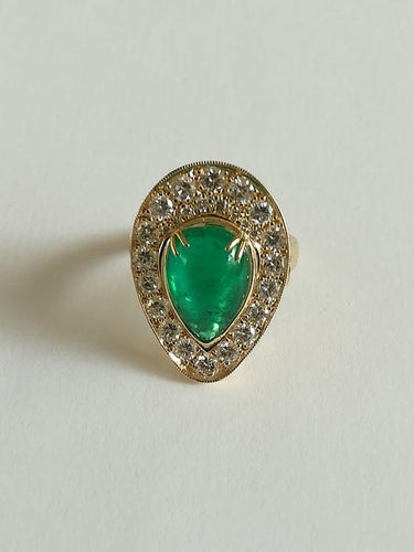 Bague 54 Bague marquise en or jaune, émeraude et diamants 58 Facettes 01347