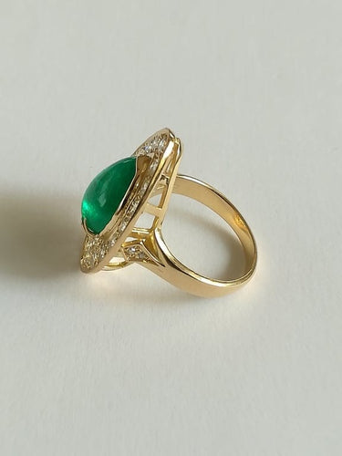 Bague 54 Bague marquise en or jaune, émeraude et diamants 58 Facettes 01347