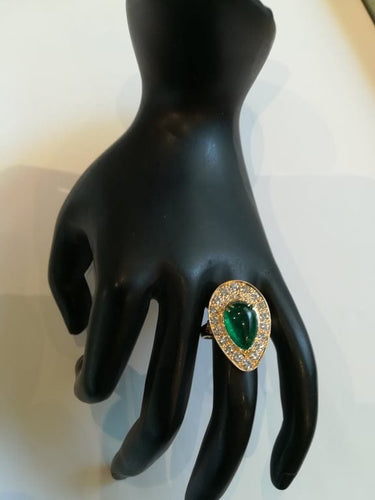 Bague 54 Bague marquise en or jaune, émeraude et diamants 58 Facettes 01347