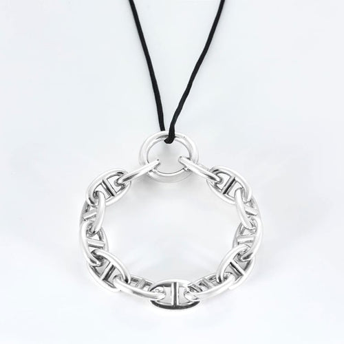 Pendentif Hermès - Chaîne d'ancre - Pendentif rond en argent et cordelière en coton noir 58 Facettes 58FC38