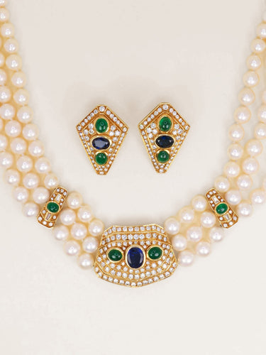 Boucles d'oreilles Parure REPOSSI collier de perles et clips saphirs émeraudes diamants 58 Facettes 1242.1
