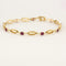 Bracelet Bracelet en or jaune ,rubis et diamants 58 Facettes B260107