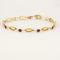 Bracelet Bracelet en or jaune ,rubis et diamants 58 Facettes B260107