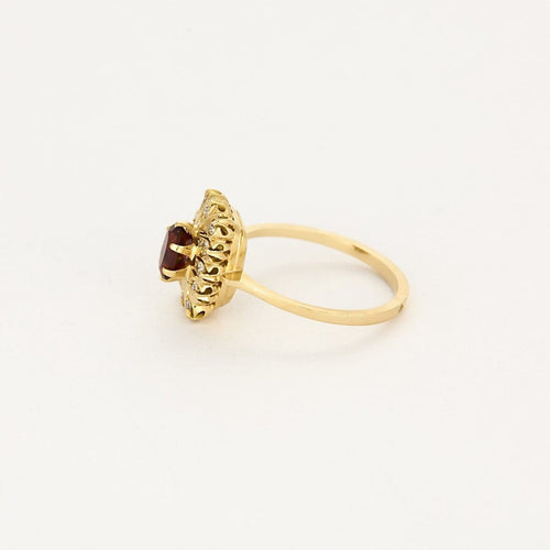 Bague 54 Bague marguerite en or jaune 18K grenat et diamants 58 Facettes PAL32243