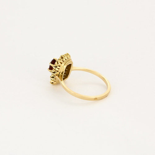 Bague 54 Bague marguerite en or jaune 18K grenat et diamants 58 Facettes PAL32243
